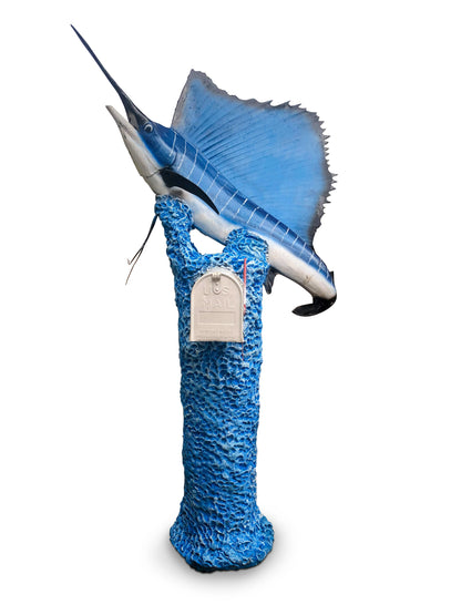 Blue marlin sailfish swordfish fish mailbox sculpture with a textured coral base