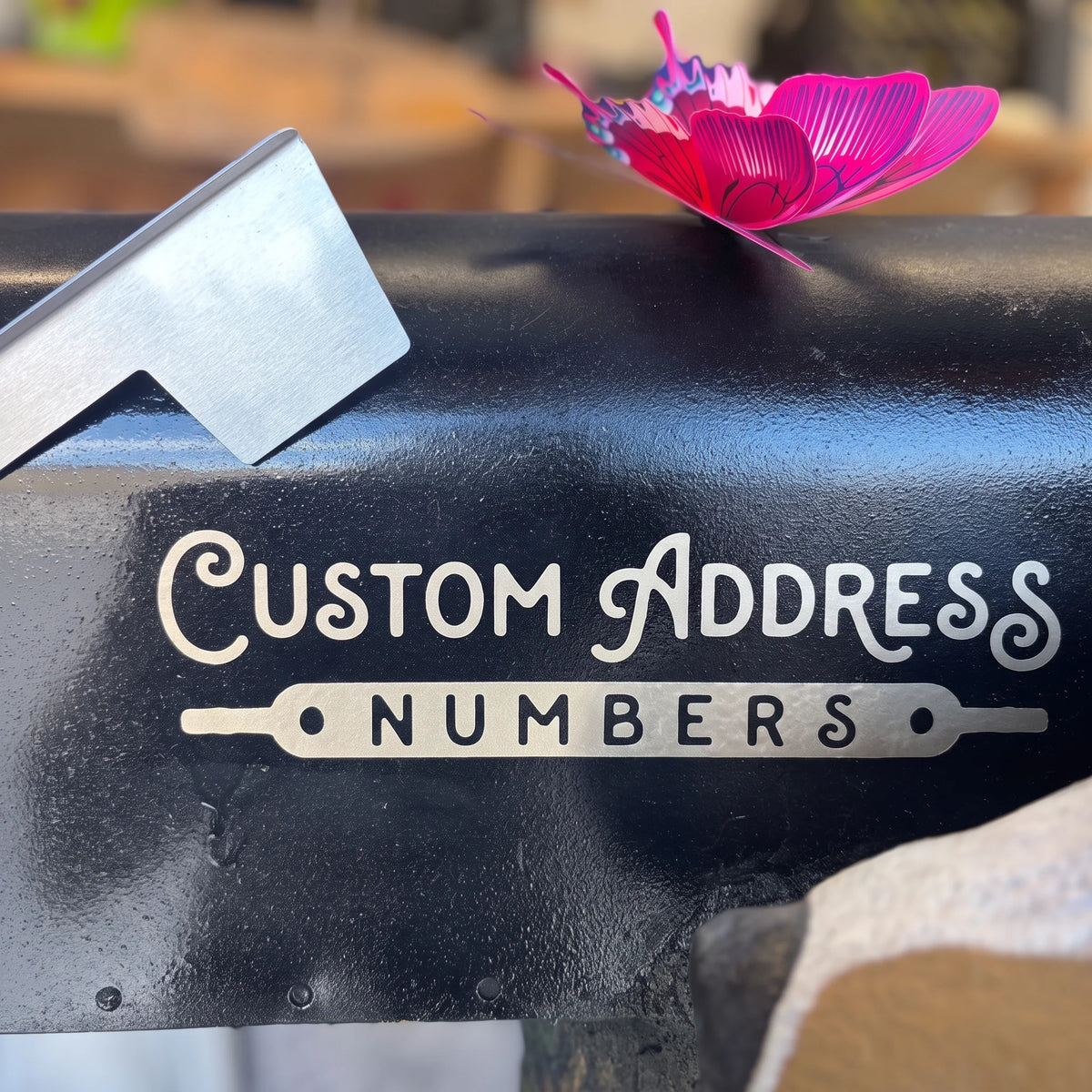 Custom address numbers on a black mailbox