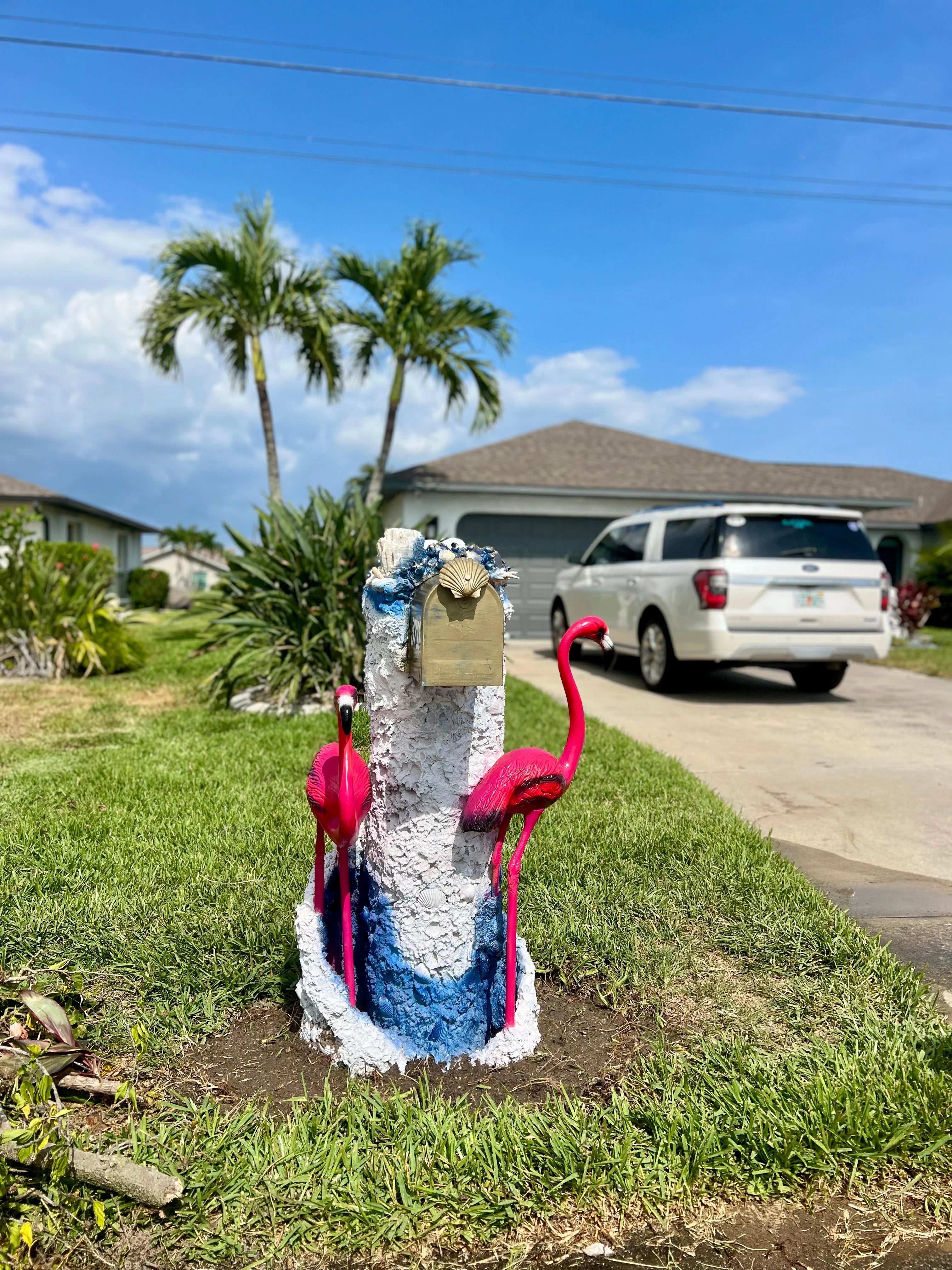 Handcrafted flamingo statue, pink flamingo by Seaside Mailbox, nautical cement art for coastal homes.