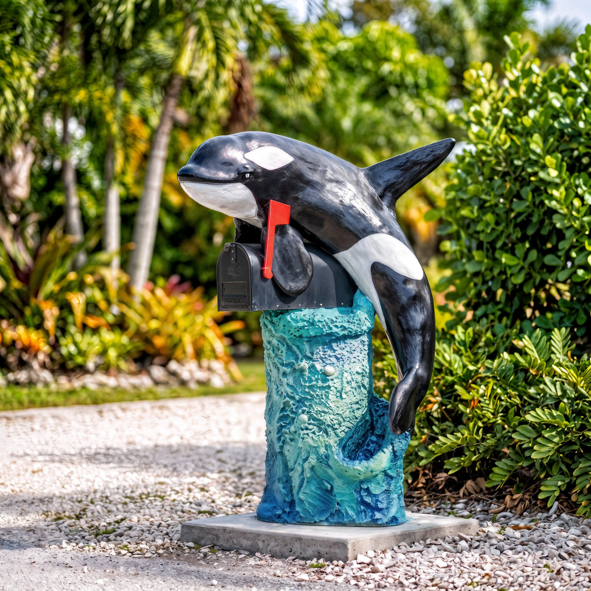 Killer whale orca mailbox sculpture on a blue wave base