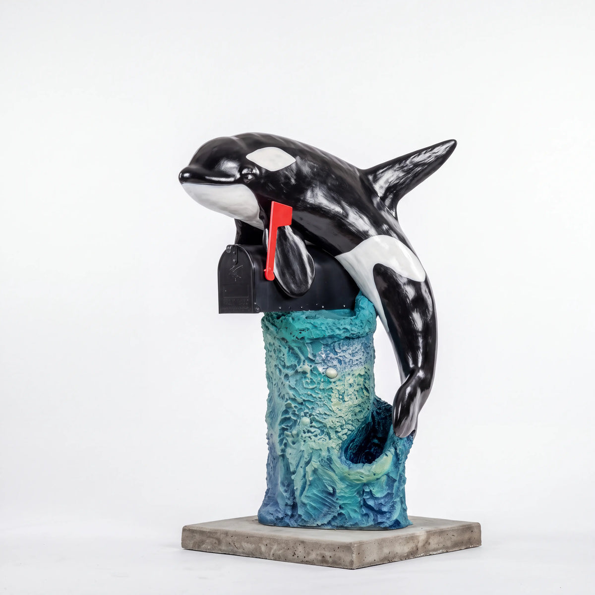 Killer whale orca mailbox sculpture on a white studio background